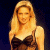 A pixelated contact sheet showing two frames of an animated icon featuring a woman with long blonde hair in a dark dress on the left and green text reading "Original Icons .com" on the right against a dark background.