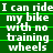 Green background with white pixelated text repeating 'I can ride my bike with no training wheels' in a pattern