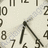 A 4-frame animated contact sheet showing a clock face with black numerals and hands on a light background, paired with pixelated text reading "Our Love Is Ticking Away" in white against black sections of the frame.