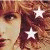 A static image of a person with reddish-brown hair and white stars overlaid on the face and hair, displayed in a