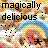Pixelated static image with bold black text reading "magically delicious" over a multicolored pixel background featuring brown, blue, yellow, and pink tones.