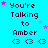 Pixelated text reads "You're Talking to Amber" with three heart symbols below, set against a bright cyan background with scattered pink and light blue stars.