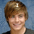 A person with brown hair and a black shirt appears in three views: top-left with a white 'I' above the head, top-right with a white '<3' above the head, and bottom-left with 'ZAC EFRON!' text overlaid on the image.