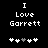 Black background with white pixelated text "I Love Garrett" and five heart symbols below, where the third heart changes from gray to white between frames.