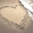 A heart-shaped icon with a textured beige background and blue text reading "love with all your heart" on the right side.