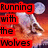 Animated wolf howling at moon with red text "Running with the Wolves" and smiley face on orange background.