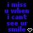 Blue pixelated text on black background reads 'i miss u when i cant see ur smile' with white heart symbol at bottom right.