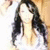 A woman with long dark hair in a white top appears across four , each showing subtle variations in lighting and background elements