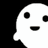 Pixelated white ghost face with two black circular eyes and a small curved mouth on solid black background.