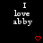 Black background with white pixelated text reading "I love abby" and two red pixelated hearts below the text.