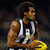 Three distinct views of a person in a black-and-white striped sports jersey holding a yellow ball, displayed in a