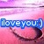 Pixelated image with pink and purple gradient background, blue rectangular text box containing white pixelated text 'iloveyou:)' over dark curved shape.
