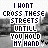 Pixelated text reads "I WONT CROSS THESE STREETS UNTILL YOU HOLD MY HAND" over a grayscale background with two small heart symbols.