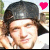 Animated contact sheet showing three frames of a person wearing a black cap with arms behind head, each frame featuring a different colored heart icon in the top-right corner.