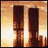 five distinct pixelated images including twin towers, a man's face, an eye, clouds, and the word 'Remember' on black