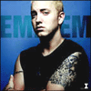 repeated images showing a person with short blonde hair wearing a black sleeveless shirt, set against a blue background with repeating text