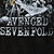 A pixelated animated contact sheet showing two frames of a buddy icon with metallic text and a white heart symbol on a dark background.