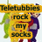 Pixelated image of four Teletubbies characters with overlaid text reading "Teletubbies rock my socks" in yellow boxes.