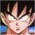 Pixelated close-up of a character's face with spiky hair, glowing eyes, and an open mouth against dark background.
