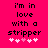 Pixelated text on bright pink background reads 'i'm in love with a stripper' with five white hearts below, two of which are pink in one version.