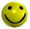 Yellow spherical smiley faces with black eyes and curved mouths arranged in a on gray background