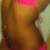 A pixelated image shows a person in pink clothing with visible skin and green background, alongside bold text reading "Exotik".