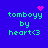Pixelated green text 'tomboy by heart<3' on blue background with pink pixel art symbols above and to the right of text.