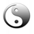 A grayscale yin-yang symbol with smooth gradient shading, featuring a small white dot in the dark section and a small black dot in the light section, enclosed within a circular border.
