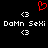 Red pixelated heart symbol above white text reading "D@Mn SeXi" flanked by two left-pointing brackets on a black background.