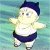 Pixelated character with light skin, dark blue hair, and dark blue shorts floating against a greenish-blue striped background.