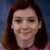 four pixelated images showing a person with brown hair against a blue background, displaying different facial expressions