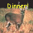 Yellow pixelated text 'Dinner!' appears above a pixelated figure with dark hair and light clothing against a brownish background.