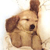 Static pixelated image of a dog's head with brown and tan coloring, visible ear, eye, nose, and mouth features on a light background.