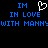 Blue pixelated text on black background reads "IM IN LOVE WITH MANNY" with a white heart symbol replacing the 'O' in LOVE.