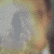 A pixelated figure with light brown hair holds a black object near their face against a muted green background.
