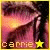 A pixelated image of a person with long dark hair and pinkish-purple skin, featuring the text 'carrie' at the bottom left and a star symbol that changes from yellow to pink.