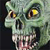 Pixelated green skull with yellow eyes and a pink tongue, set against dark background.