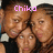 Three people pose closely together in a group photo with pink text labels above each person's head.