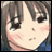 Anime-style character face with brown hair and rosy cheeks, next to pixelated text on black background.