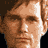 Static image with red text on black background featuring a partial headshot of a man with light brown hair and a serious expression.