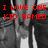 Black-and-white image with red pixelated text reading "I LOVE ONE KID NAMED JESSE!!!!" over a blurred background of figures.