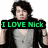 A pixelated image of a person with dark hair wearing a gray shirt and black jacket, with green text overlays reading "I LOVE Nick" and "And his SHOES!" over a shoe.