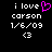 Pixelated text and symbols on black background with one frame showing a pink heart symbol replacing the 'i love' text's space.