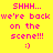 Yellow background with pink pixelated text reading 'SHHH... we're back on the scene!!! :)' repeated twice in a