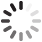 A grayscale pattern of small rectangular and rounded shapes arranged in circular clusters on a light gray background.
