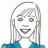 Pixelated static image of a person with light-colored hair, dark eyes, and a smiling mouth showing teeth, wearing a blue top against a white background.