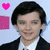 A person in a black suit and white shirt appears across six with changing heart icons above their head