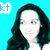 Pixelated image of a person with long dark hair against a bright cyan background, featuring a small white square with blue 'kt' text in the top-left corner.