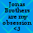 Blue background with light blue diamond pattern, text 'Jonas Brothers are my obsession <3' in black pixelated font arranged in four identical quadrants.