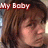 Pixelated image of a person with brown hair and closed eyes, overlaid with red text reading 'My Baby' at the top.